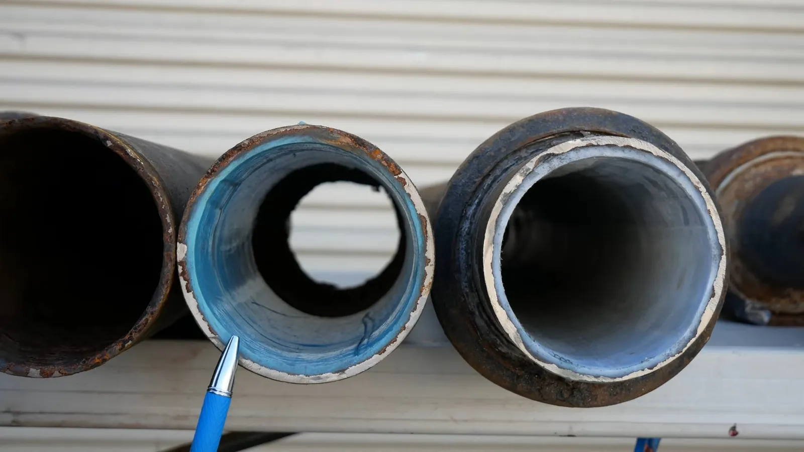 The lined sewer pipe sample cross sections documented during plumbing work in the Federal Way area.